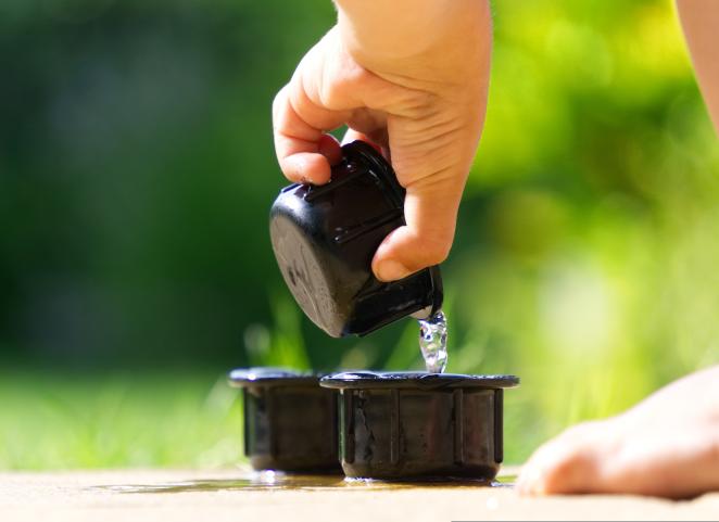 Child playing with water