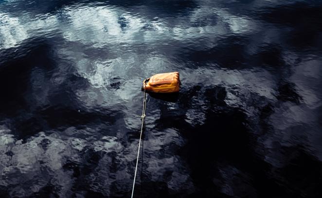 plastic bottle in water