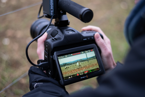 Man using video camera