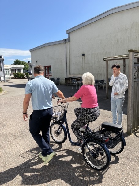 Woman riding tricycle in Varberg