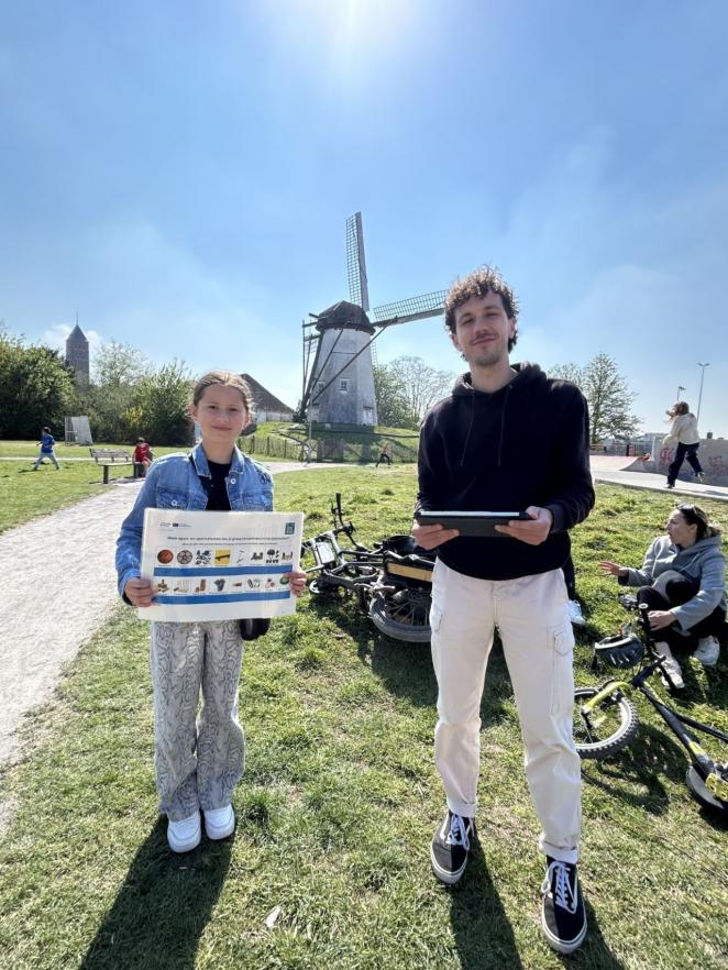 Photo of child and young man participating in survey
