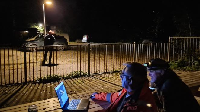 Adjusting streetlight in Holwerd