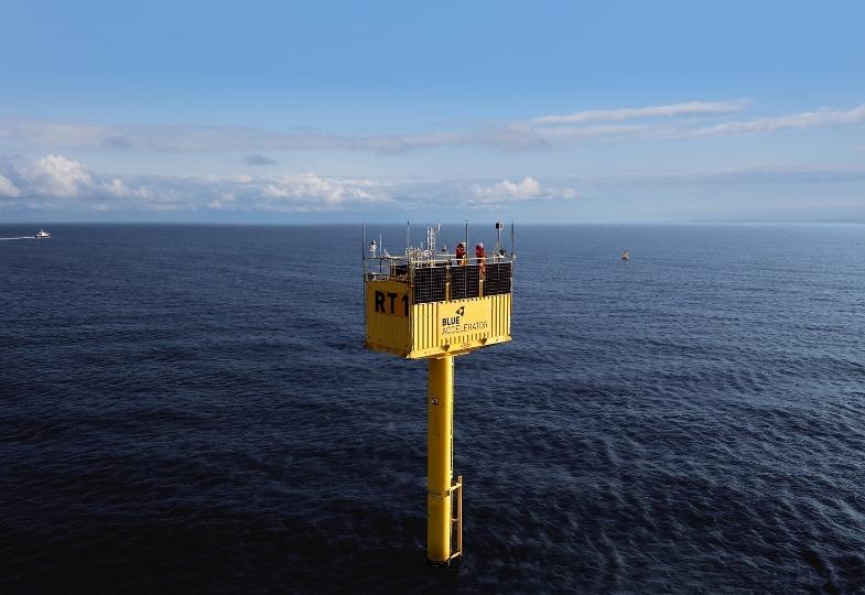 Yellow platform rising above a dark blue ocean.