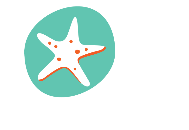 A white starfish with orange dots on a green background