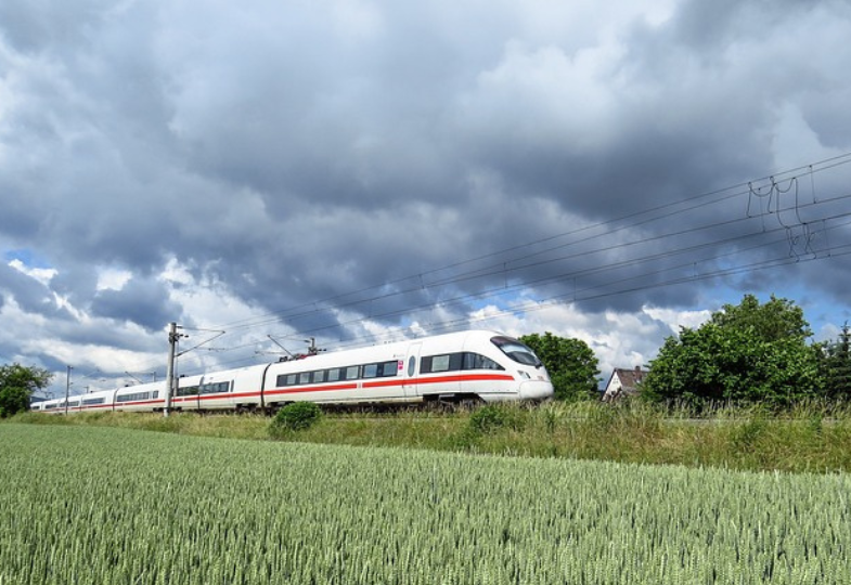 Train under dark skies going fast