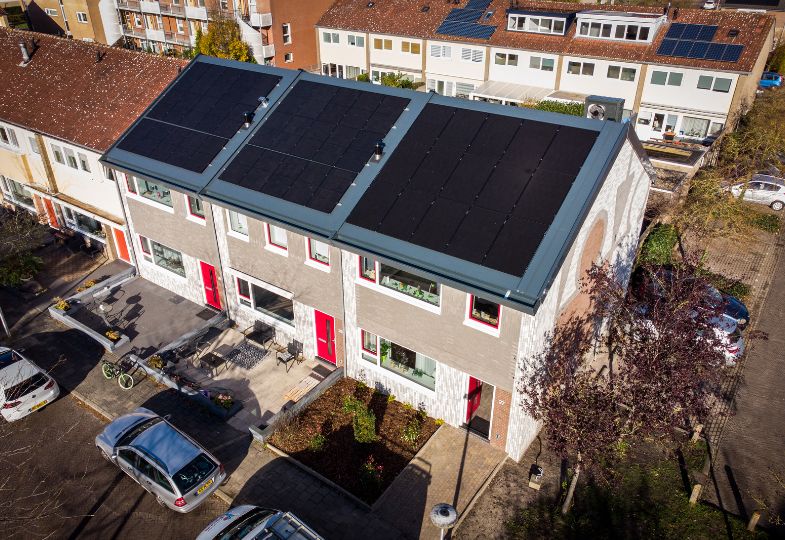 The three houses retrofitted by INDU-ZERO including solar panels and insulating cladding