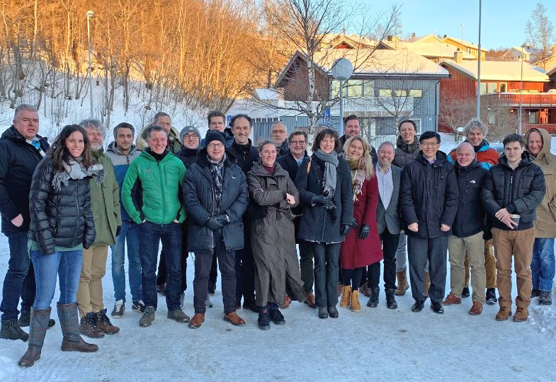 Group photo of the INDU-ZERO team in a snow-clad landscape