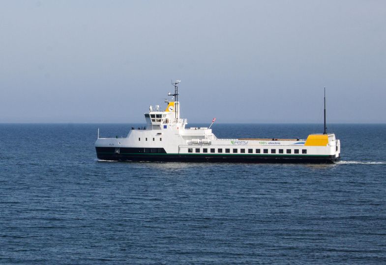 A ferry sailing across an ocean.