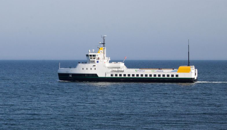A ferry sailing across an ocean.