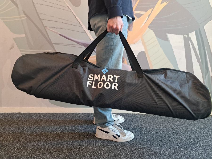 Wearable rolled up Smart Floor in a bag for transport