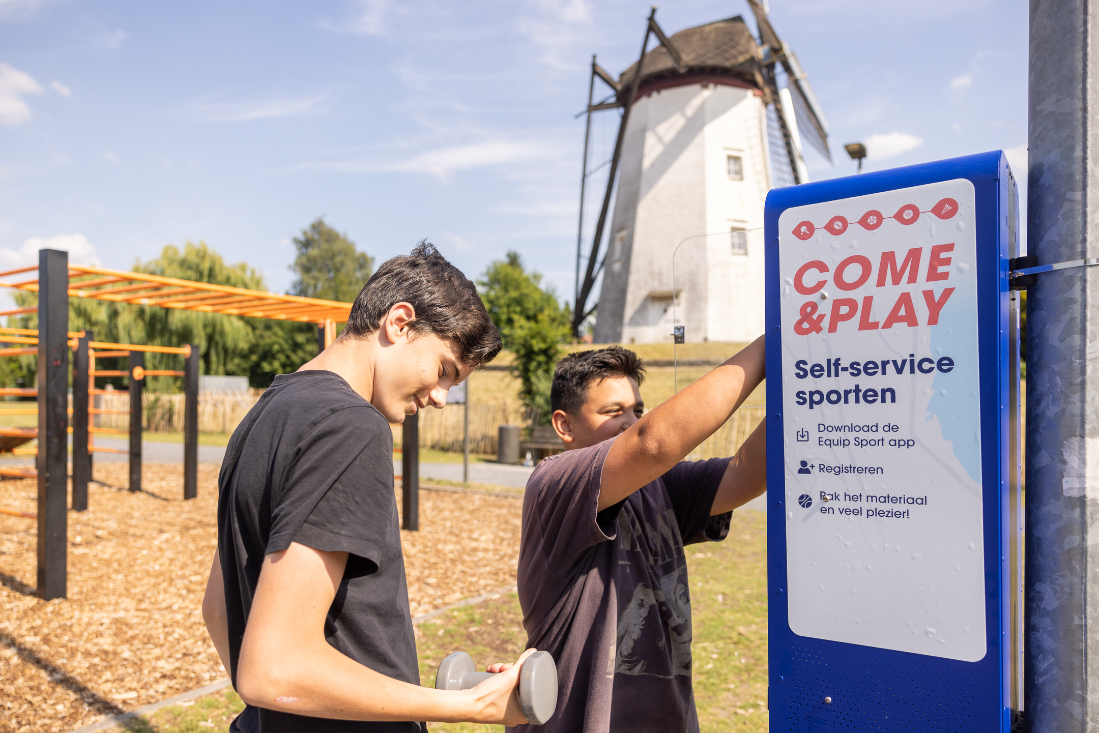 Photo of sport sharing station being used by two boys