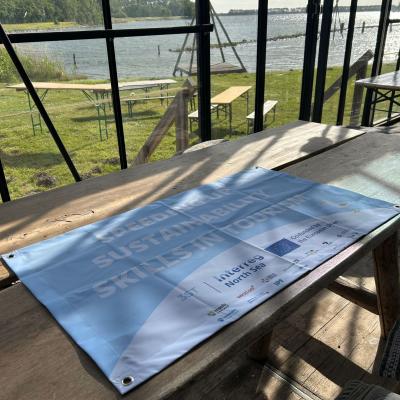 3ST flag on table during pilot meeting in Goes
