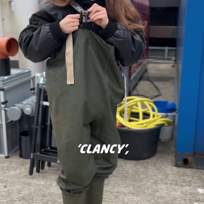 Carlotta putting on her gear