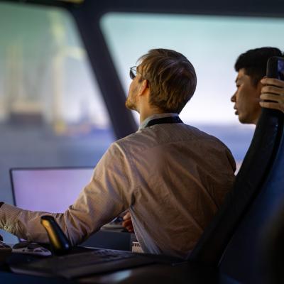 ships and offshore wind turbines visible in the background