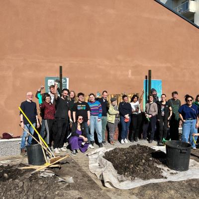 Group photo of volunteers taking part in gardening