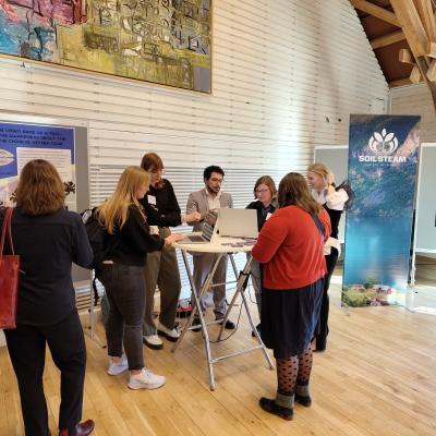 Students give a demonstration of Mitten Mayhem