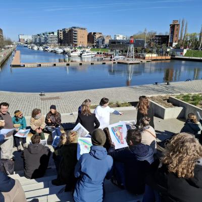 Photo of partners looking at city maps