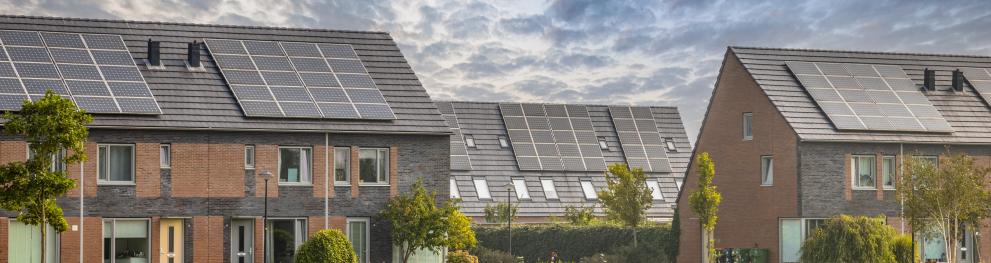 Row of modern houses with solar panels