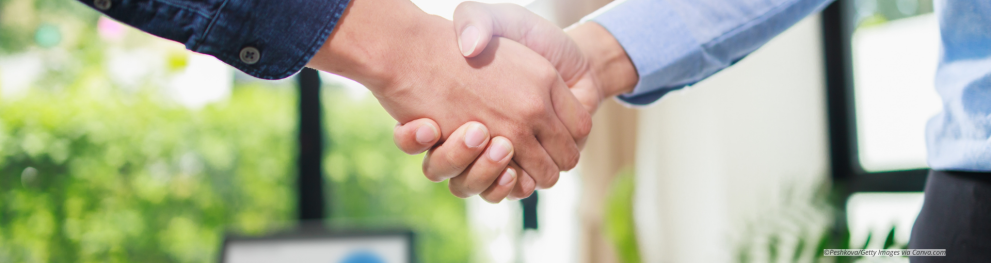 Close-up of a handshake.