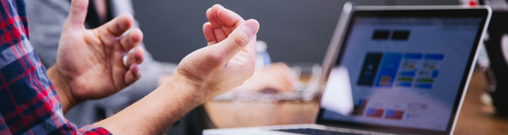 A person engaging in a webinar. Photo: Headway on Unsplash.