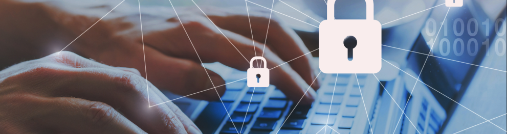 Close-up of laptop with illustrations of padlocks on top.