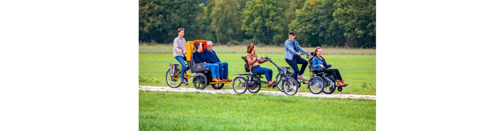 Group of people cycling with different adapted vehicles