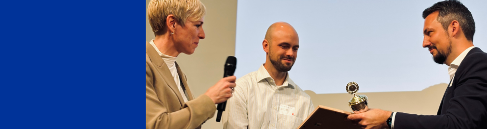 Handing award to the winner 
