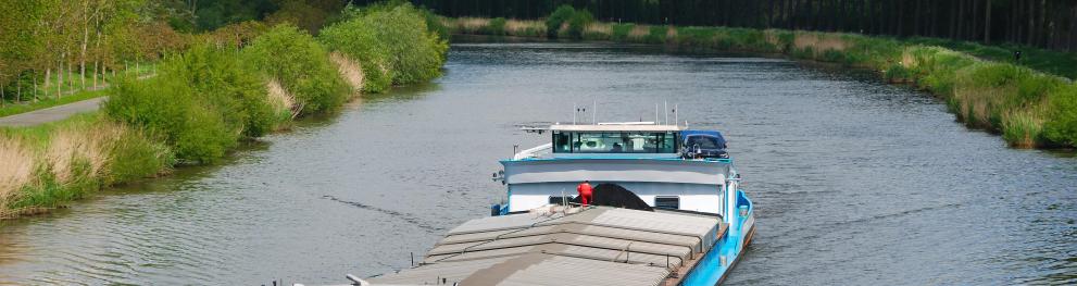 A boat is sailing on a river
