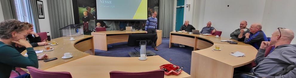 people sitting around a conference table