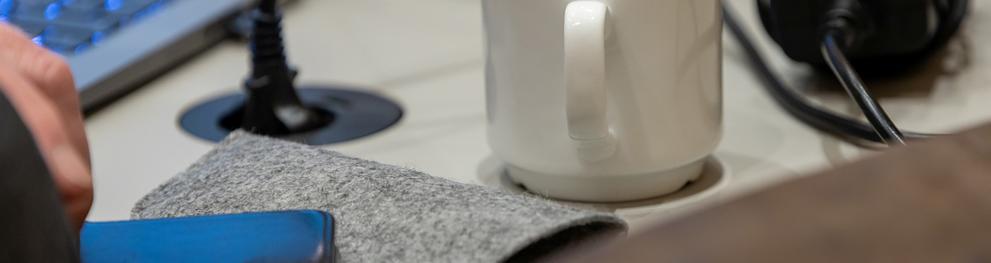 A mug and a computer