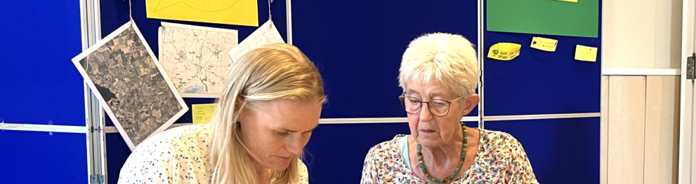 two women discussing something